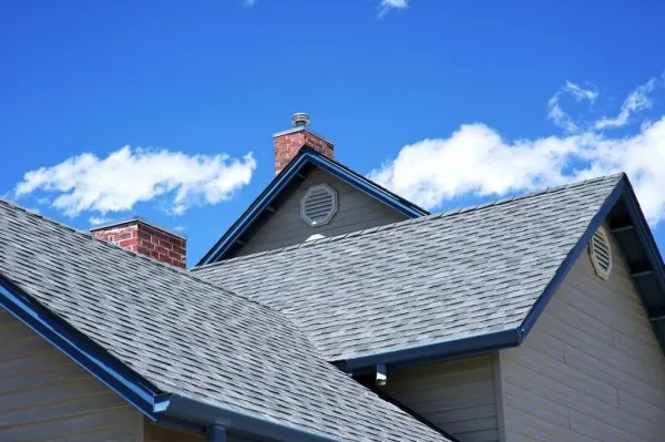 New gray architectural shingle roof replacement on a home